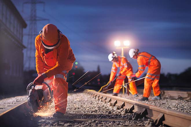 Men working at a train track